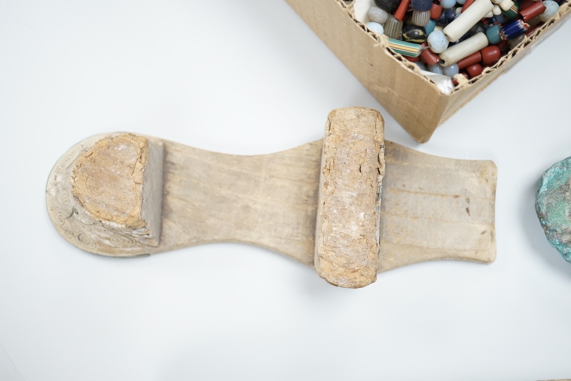 A pair of Turkish bath shoes, a collection of African beads and Middle Eastern vessels etc.